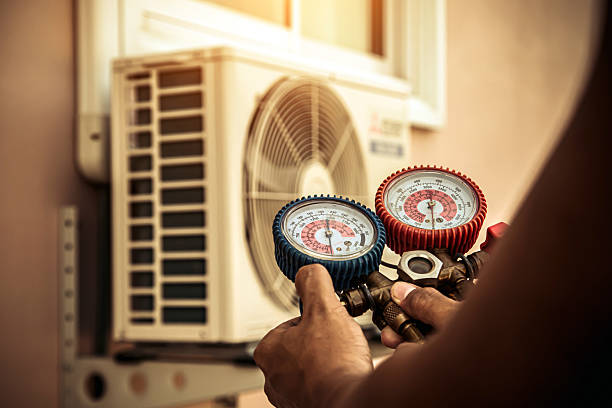 Professional Air Conditioning Service technician working in Preble, NY